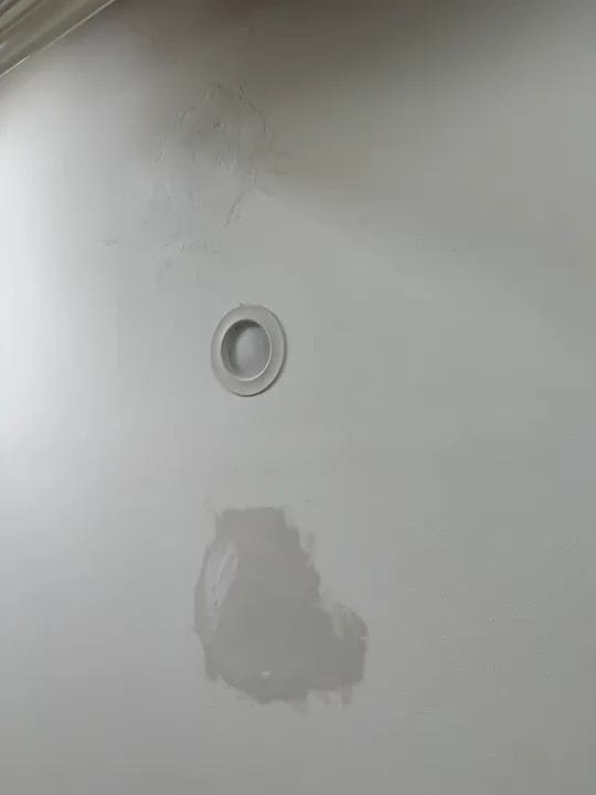 Ceiling patch and joint compound around a light fixture opening