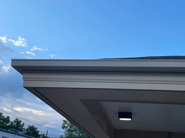 Commercial drive-through canopy with fascia, soffit and supporting columns