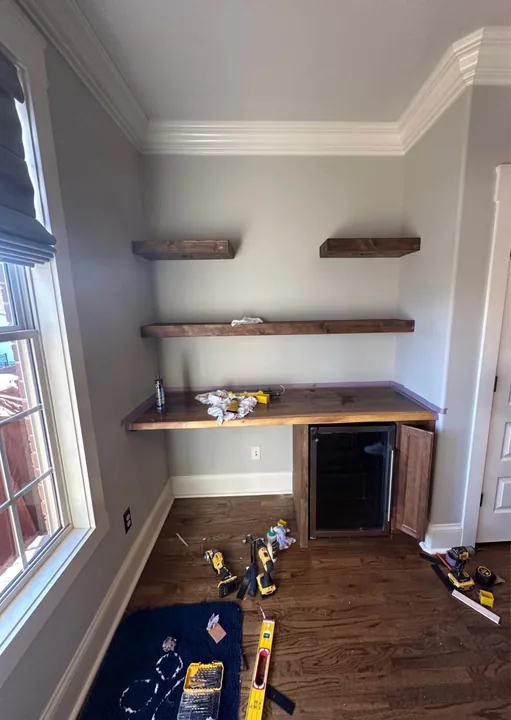 Wood flooring through a light interior and doorways