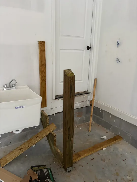 Small timber steps at an interior doorway