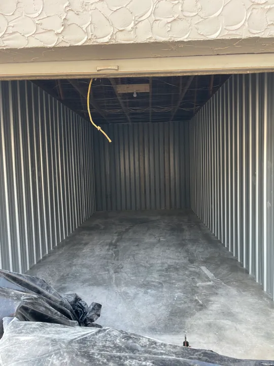 Vertical metal wall panels inside a small commercial room