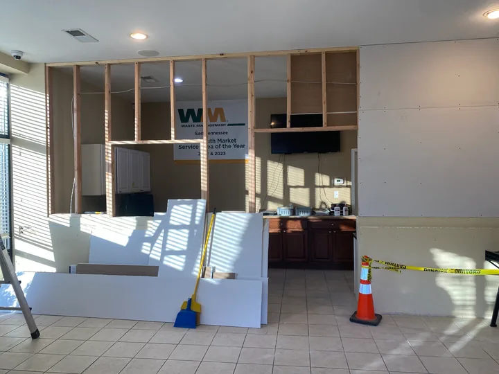 New partition framing and wallboard in a commercial interior