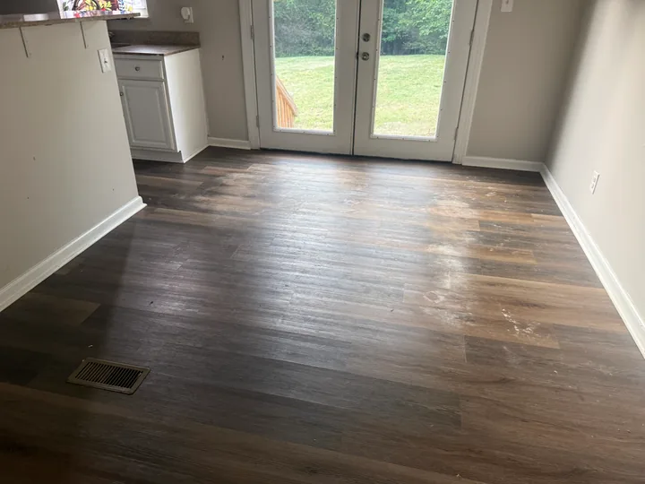 Wood-look plank flooring through rooms and doorways