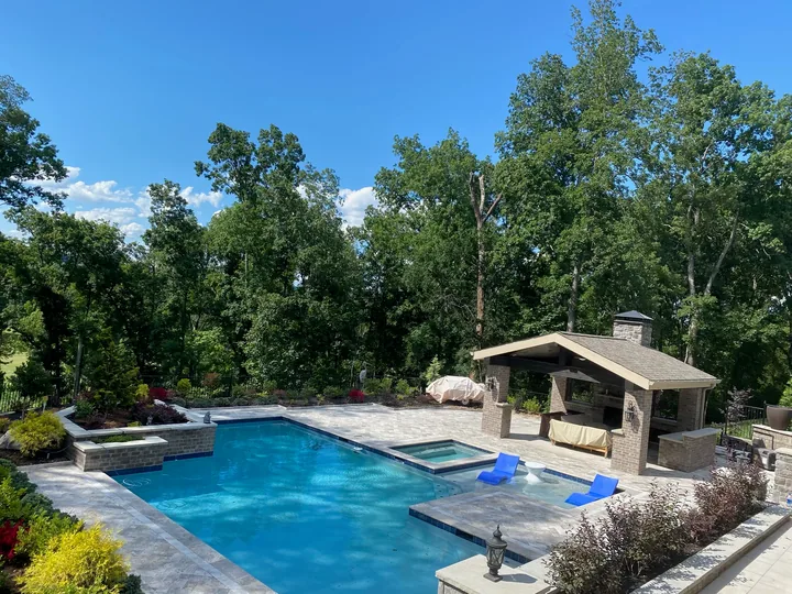 Paver patio, pool edge and covered outdoor structure