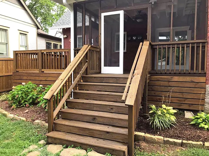 Timber porch stairs, handrails and a covered entrance