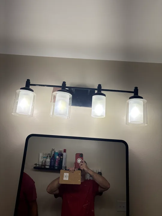 Three-light bathroom vanity fixture and mounting detail