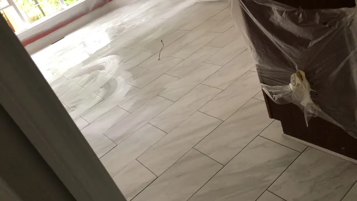 Large rectangular floor tile and doorway transitions