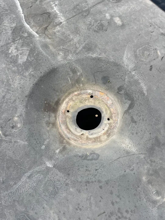 Toilet flange and exposed floor connection without the fixture in place