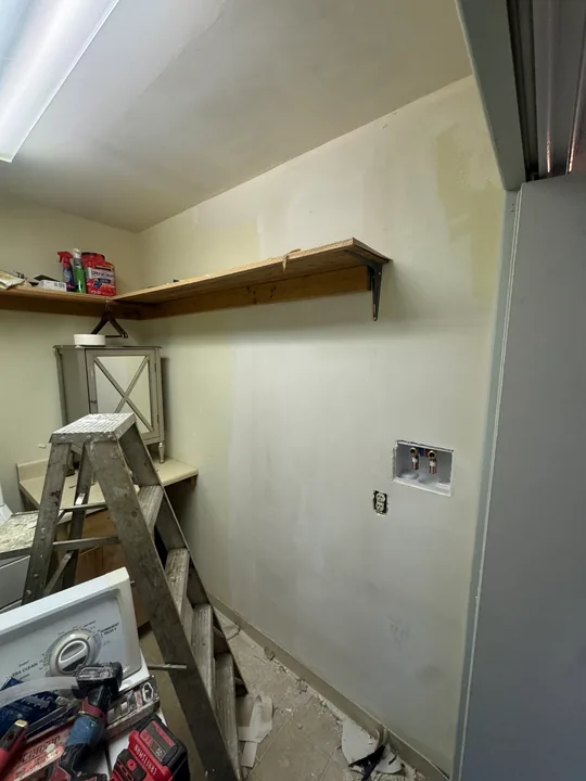 Utility room ceiling opening, drywall patch and finishing work