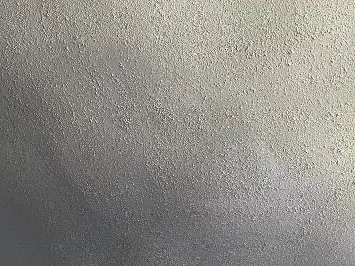 Close view of a textured interior wall finish