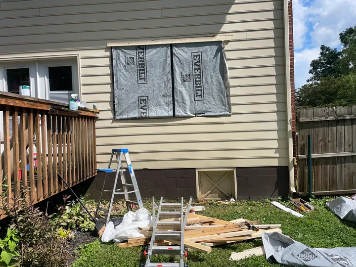 White window frame and trim viewed from outside and inside a room